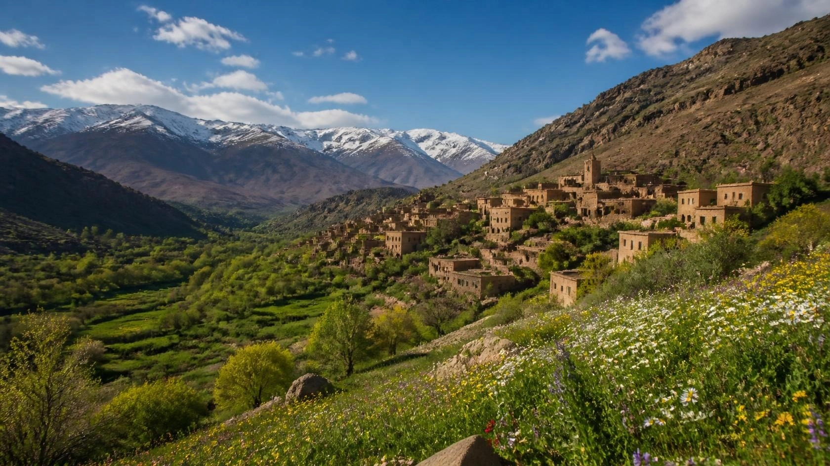 Green High Atlas Mountains valley in spring, best time to visit Morocco